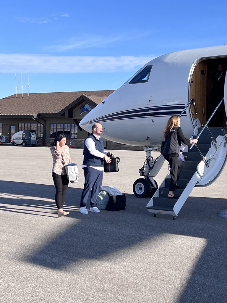 ESS detail escorting principals boarding private jet